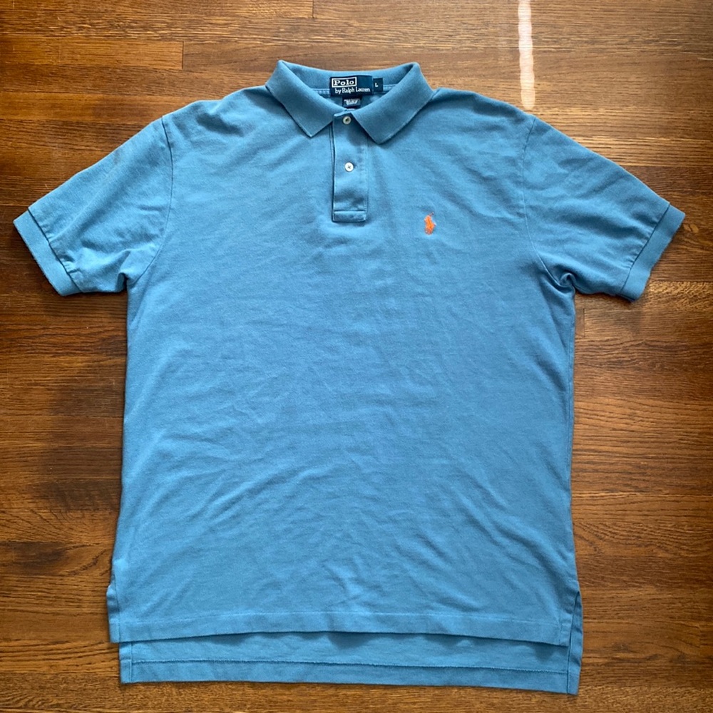 Men’s short sleeve polo by Ralph Lauren size large blue with orange pony